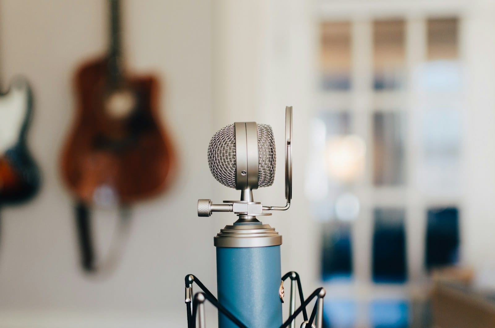 Photo by Kelly Sikkema black and gray condenser microphone